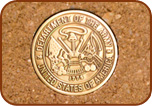 closeup army medallion on brick