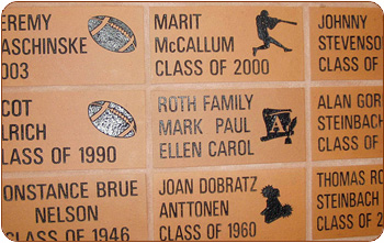 engraved brick tile wall sports symbols